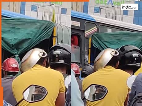 कुछ नहीं मिला तो कढ़ाई को ही बना लिया हेलमेट, वायरल हो रहा देसी जुगाड़ का अजब वीडियो