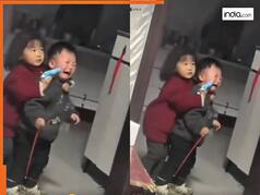 Funny Video Today: भाई को बंधक बनाकर मम्मी से कैंडी मांगने लगी बच्ची, फिर जो दिखा दिल हार जाएंगे | देखें वीडियो