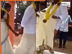 Dulha Dulhan Ka Video: फेरों के दौरान अचानक खुल गई दूल्हे की धोती, चाहकर भी हंसी ना रोक सकी दुल्हन | देखें फनी वीडियो