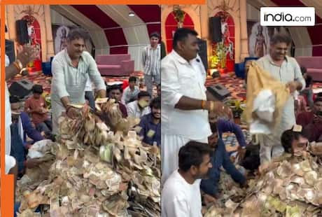 Gujarati folk singer performs nonstop as fans shower lakhs of rupees on him during  event; Watch viral video