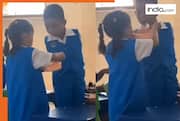 5-year-old girl feeds lunch to disabled boy in school; kind gesture goes viral | Watch