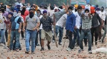 Sikh protests in Jammu & Kashmir Update: Jammu-Pathankhot National Highway blocked, curfew imposed in parts of Jammu Sikh protests in Jammu & Kashmir Update: Jammu-Pathankhot National Highway blocked, curfew imposed in parts of Jammu